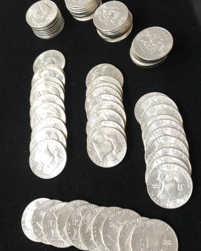 Uncirculated Silver Franklin Half Dollar Coins In Stacks